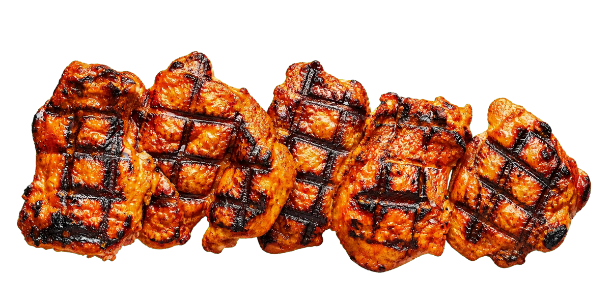 Five pieces of glossy char-grilled peri-peri chicken